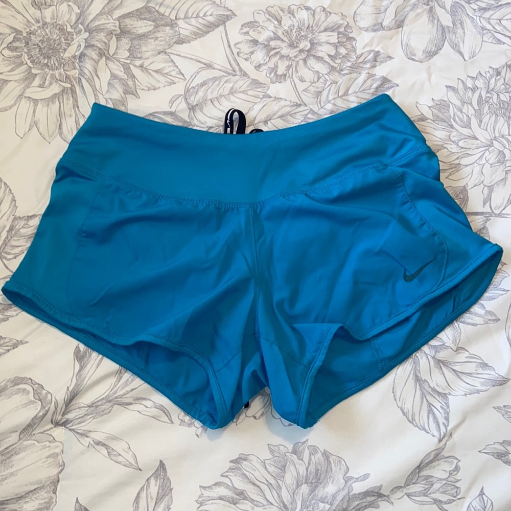 Light blue Nike running shorts
